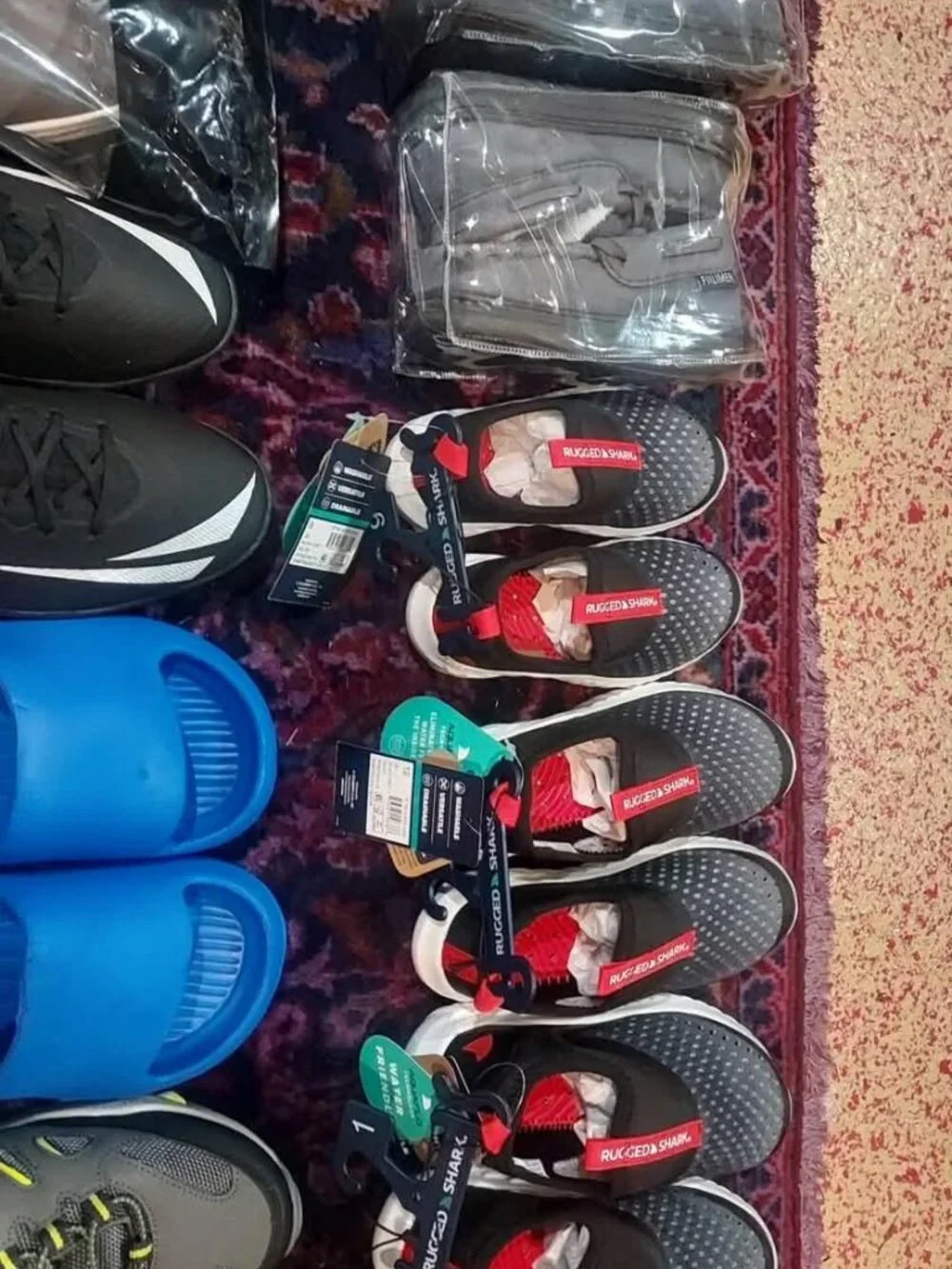 Pallet of brand new Kids and Toddlers Beach Shoes and other water shoes